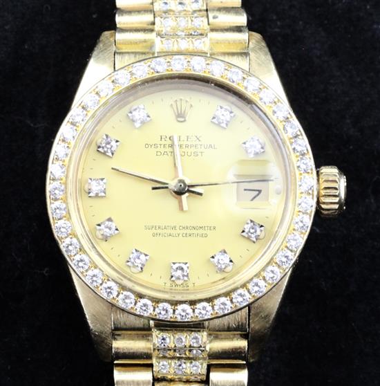 A ladys 1980s 18ct gold and after market diamond set Rolex Oyster Perpetual Datejust,